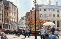 This ancient centre of Durham City is the crossroads of Silver Street, Saddler Street and Claypath. The statue of 
Neptune which was originally erected in 1729 can just be observed behind the carousel.
